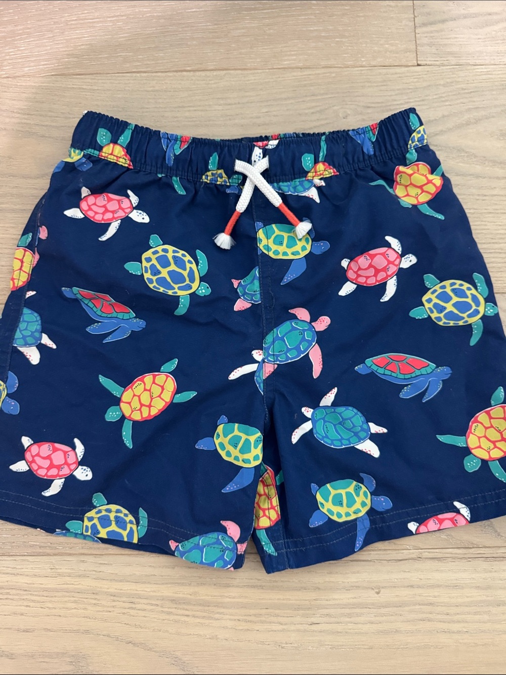Mini Boden Navy Swim Shorts with Colorful Turtle Print